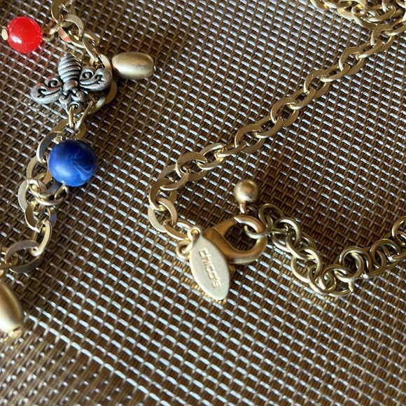 Chico’s long gold tone necklace with whimsical charms. NWOT - Picture 4 of 5